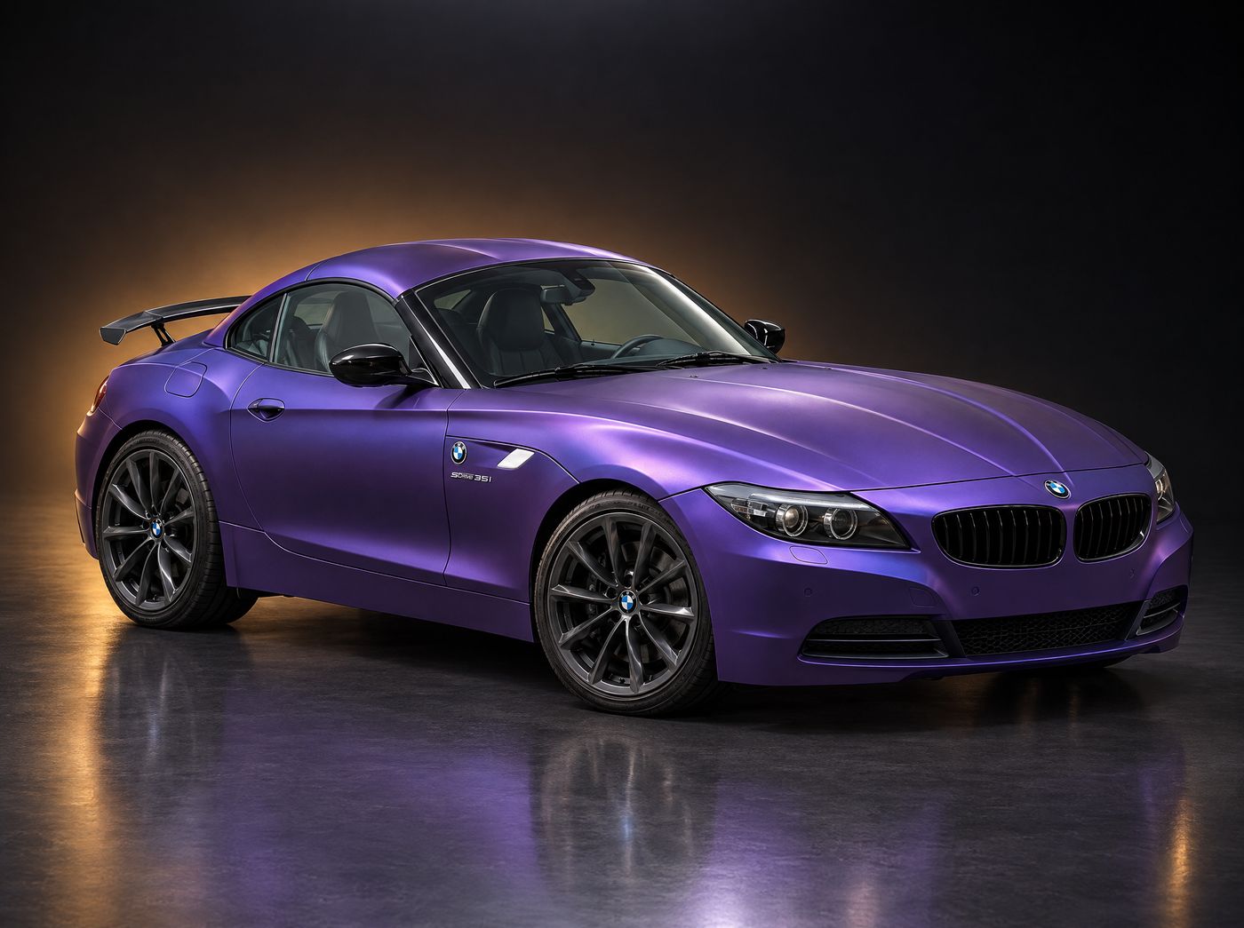 The same purple Z4 in a dark studio with an amber rim light